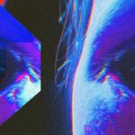 a close up of a person's face with a blurry background